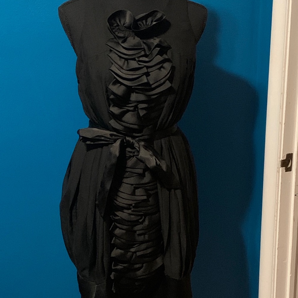 Sleeveless Black mini dress with ruffled front